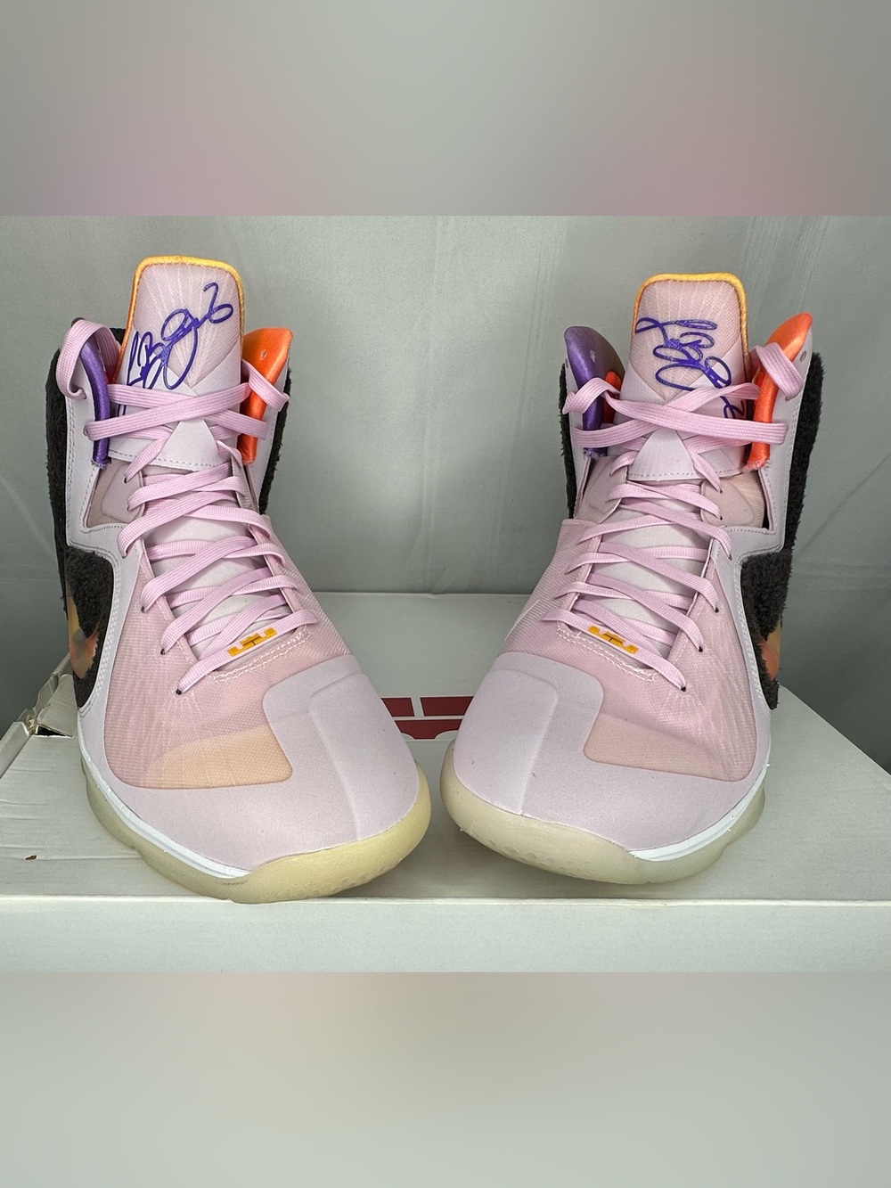 Nike Men’s Pink High-Top Athletic Sneakers with Purple & Orange Accents